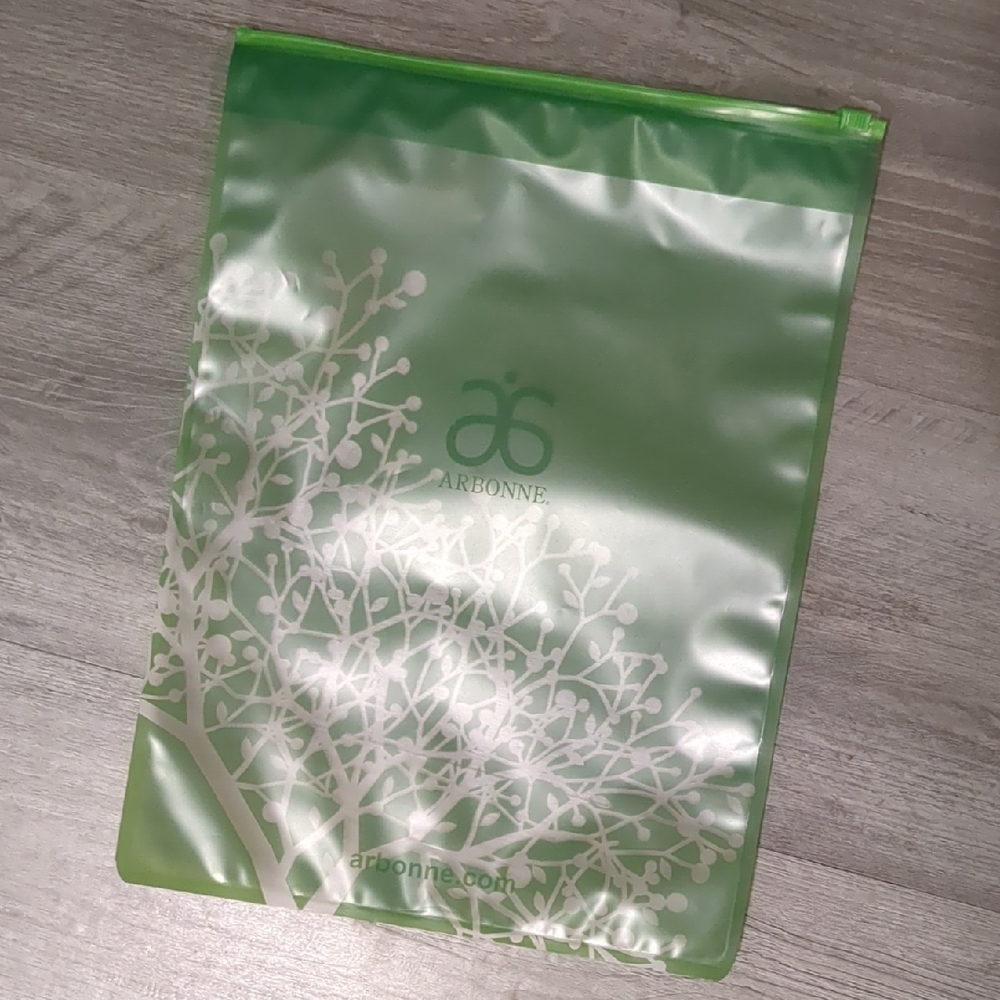 Arbonne Translucent Green Pouch with White Tree Design
